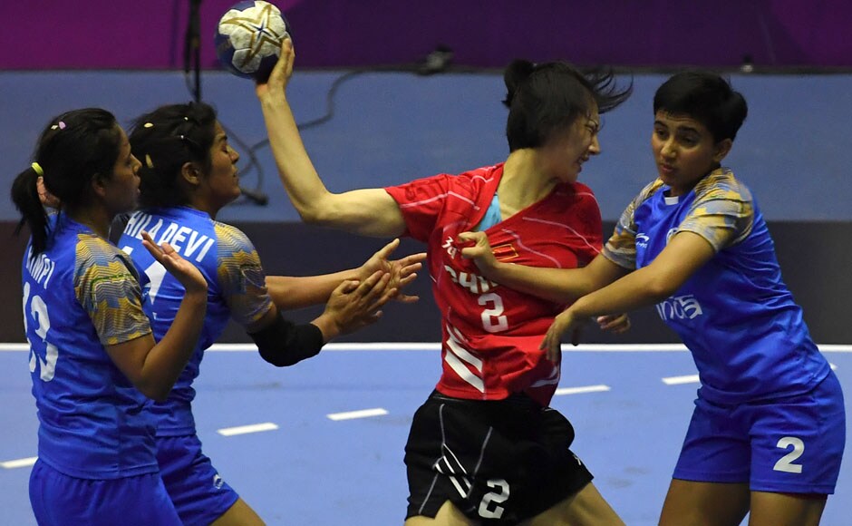 The Indian women's handball team lost to China in their Group A match. The Indians were unable to hold off China's attack, losing 36-21 to remain rooted at the bottom of the table. AFP The Indian women's handball team lost to China in their Group A match. The Indians were unable to hold off China's attack, losing 36-21 to remain rooted at the bottom of the table. AFP