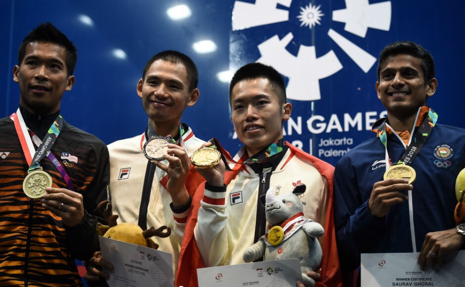 Saurav Ghosal displays his bronze medal won in the men's singles squash event. AFP Saurav Ghosal displays his bronze medal won in the men's singles squash event. AFP