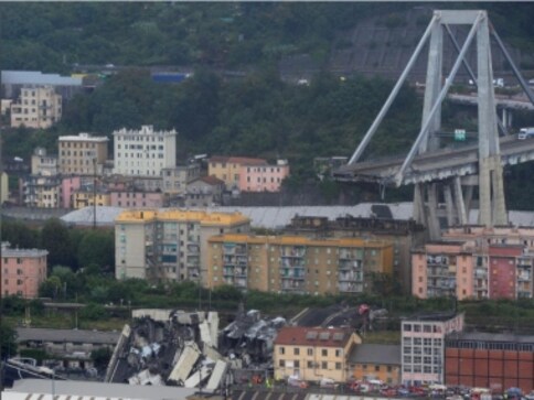 Motorway bridge collapses in Italy's Genoa during torrential rain; 10 killed, dozens feared dead by ambulance officials