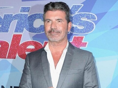 Music mogul Simon Cowell to be honoured with star on Hollywood Walk of Fame Music mogul Simon Cowell to be honoured with star on Hollywood Walk of Fame