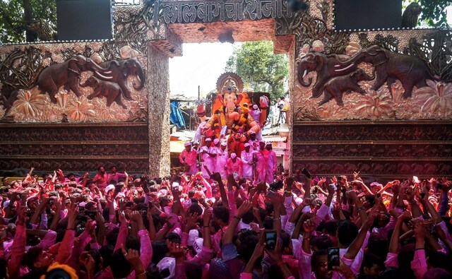 Devotees in Mumbai carried the idol of the popular 'Lalbaugcha Raja' for immersion on the last day of the Ganpati festival. PTI Devotees in Mumbai carried the idol of the popular 'Lalbaugcha Raja' for immersion on the last day of the Ganpati festival. PTI