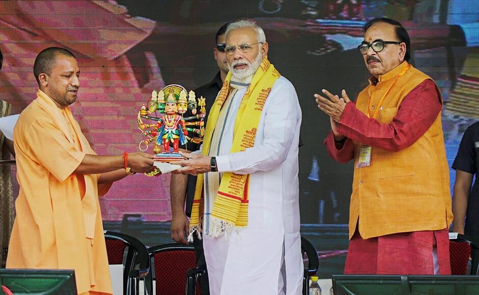 On the second day of his visit, Uttar Pradesh chief minister Yogi Adityanath presented a memento to Narendra Modi. The prime minister also inaugurated projects worth Rs 550 crores which were largely seen as an attempt to reach out to the people of his constituency and the eastern Uttar Pradesh. PTI On the second day of his visit, Uttar Pradesh chief minister Yogi Adityanath presented a memento to Narendra Modi. The prime minister also inaugurated projects worth Rs 550 crores which were largely seen as an attempt to reach out to the people of his constituency and the eastern Uttar Pradesh. PTI