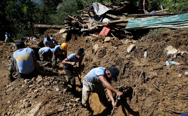 The death toll in the Philippines, where the main island of Luzon was mauled with fierce winds and rain, rose to 65 as rescuers pulled more bodies from a huge landslide in the mountain town of Itogon. AP The death toll in the Philippines, where the main island of Luzon was mauled with fierce winds and rain, rose to 65 as rescuers pulled more bodies from a huge landslide in the mountain town of Itogon. AP