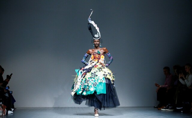 A model presenting a multi-coloured Matty Bovan ball gown on Day 1 of the London Fashion Week in London, Britain. Bovan's collection featured full skirted ladies moulded into a collection of corsets and crinolines and spoke of the designer's idea of self. Reuters/Henry Nicholls A model presenting a multi-coloured Matty Bovan ball gown on Day 1 of the London Fashion Week in London, Britain. Bovan's collection featured full skirted ladies moulded into a collection of corsets and crinolines and spoke of the designer's idea of self. Reuters/Henry Nicholls