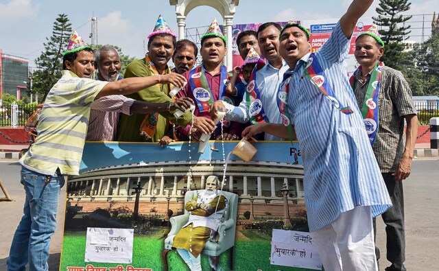 Bihar chief minister Nitish Kumar greeted the prime minister on Twitter, where he wished for Modi's good health and long life. In Patna, National Democratic Alliance supporters poured milk on a portrait of Modi to celebrate the day. PTI Bihar chief minister Nitish Kumar greeted the prime minister on Twitter, where he wished for Modi's good health and long life. In Patna, National Democratic Alliance supporters poured milk on a portrait of Modi to celebrate the day. PTI
