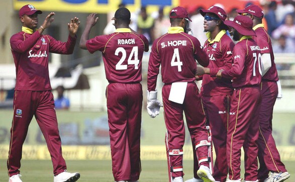 West Indies celebrate the dismissal of Rohit Sharma early in the Indian innings. AP West Indies celebrate the dismissal of Rohit Sharma early in the Indian innings. AP