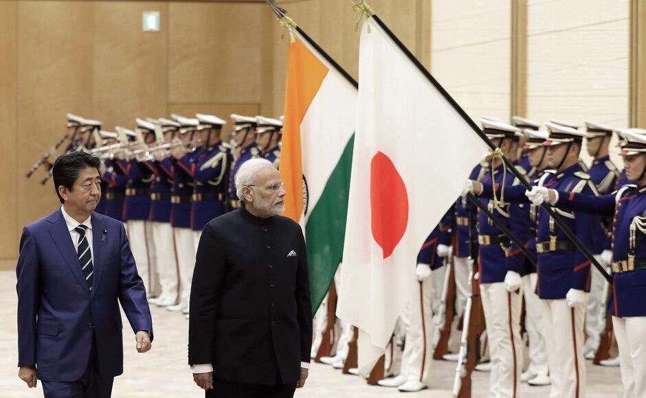 Shinzo Abe, left, escorted Modi while reviewing an honor guard ahead of a meeting at Abe's official residence. AP Shinzo Abe, left, escorted Modi while reviewing an honor guard ahead of a meeting at Abe's official residence. AP
