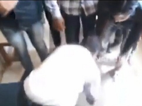 Professor in Madhya Pradesh touches feet of ABVP members in viral video; students had threatened to lodge complaint against him Professor in Madhya Pradesh touches feet of ABVP members in viral video; students had threatened to lodge complaint against him