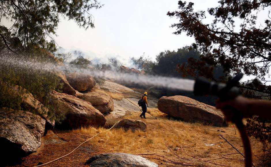 Rescuers estimate that they will need three weeks to fully contain the blaze. Evacuation orders have been issued to more than a quarter of a million people across California. Reuters Rescuers estimate that they will need three weeks to fully contain the blaze. Evacuation orders have been issued to more than a quarter of a million people across California. Reuters