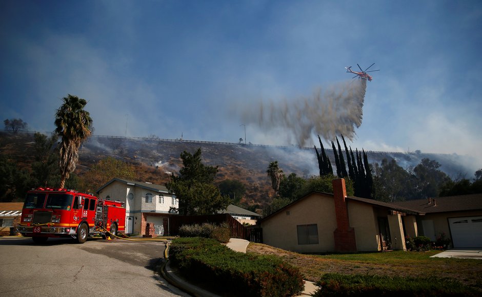 Strong winds and limited visibility become additional challenges for firefighters and rescuers as efforts to contain the fire continued for several hours. Reuters Strong winds and limited visibility become additional challenges for firefighters and rescuers as efforts to contain the fire continued for several hours. Reuters