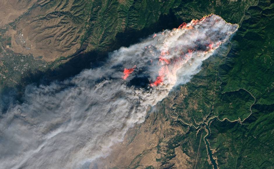 Two fast-moving wildfires that exploded in the Southern California hills have claimed several lives and forced thousands to flee their homes. NASA Two fast-moving wildfires that exploded in the Southern California hills have claimed several lives and forced thousands to flee their homes. NASA