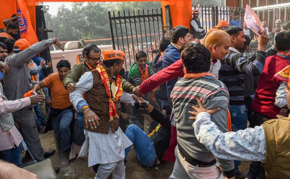 Supporters wearing saffron caps raised slogans at the VHP rally. They said: "We don't want a sample, we want temple", and "Ram rajya phir layenge, mandir wahin banayenge" (We will bring back Ram rajya, construct a temple only there). PTI Supporters wearing saffron caps raised slogans at the VHP rally. They said: "We don't want a sample, we want temple", and "Ram rajya phir layenge, mandir wahin banayenge" (We will bring back Ram rajya, construct a temple only there). PTI