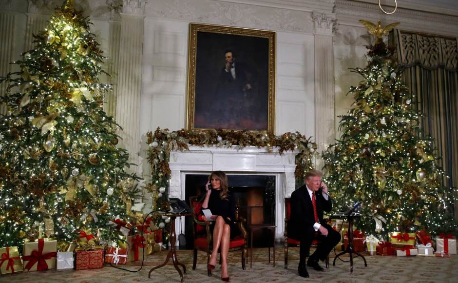 President Donald Trump and first lady Melania Trump speak on the phone sharing updates to track Santa's movements from the North American Aerospace Defense Command (NORAD) Santa Tracker on Christmas Eve ON Monday. AP President Donald Trump and first lady Melania Trump speak on the phone sharing updates to track Santa's movements from the North American Aerospace Defense Command (NORAD) Santa Tracker on Christmas Eve ON Monday. AP