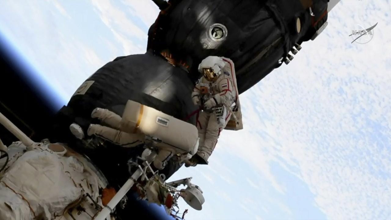 In this still captured on 11 December, 2018  from the video made available by NASA, Russian cosmonaut Oleg Kononenko (right), and Sergei Prokopyev perform a spacewalk outside the Soyuz spacecraft attached to the International Space Station. Prokopyev and Kononenko, who have explored a mysterious hole in a capsule docked to the International Space Station said that Russia’s law-enforcement agencies are now investigating its cause. NASA