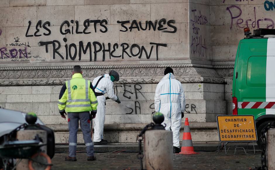 The yellow jacket movement began on 17 November. The protestors tagged the Arc de Triomphe with multi-colored graffiti, with messages such as — "The Yellow Vests will Triumph." Reuters The yellow jacket movement began on 17 November. The protestors tagged the Arc de Triomphe with multi-colored graffiti, with messages such as — "The Yellow Vests will Triumph." Reuters