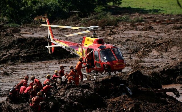 Firefighters on Monday carefully moved through mud piles, in search of survivors or bodies four days after the dam collapsed, burying mine buildings and surrounding neighbourhoods with iron ore waste. AP Firefighters on Monday carefully moved through mud piles, in search of survivors or bodies four days after the dam collapsed, burying mine buildings and surrounding neighbourhoods with iron ore waste. AP
