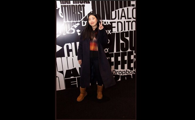 Awkwafina dons a casual look with long overcoat and boots at the Sundance Film Festival. Source: Twitter-OnTheRedCarpet Awkwafina dons a casual look with long overcoat and boots at the Sundance Film Festival. Source: Twitter-OnTheRedCarpet