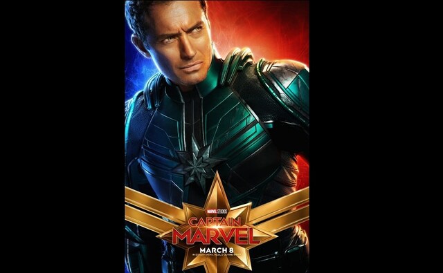 Jude Law in his green suit and golden eyes portrays the role of Captain Marvel (Mar-Vell) Jude Law in his green suit and golden eyes portrays the role of Captain Marvel (Mar-Vell)