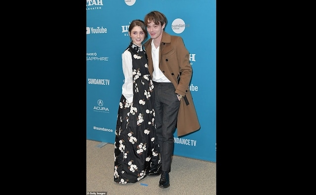 Natalie Dyer and Charlie Heaton hit the red carpet for Natalia's new film Velvet Buzzsaw at the Sundance Film Festival. Dyer was wearing a unique flowing black dress with white floral prints, with white sleeves and a white collar. Source: Getty Natalie Dyer and Charlie Heaton hit the red carpet for Natalia's new film Velvet Buzzsaw at the Sundance Film Festival. Dyer was wearing a unique flowing black dress with white floral prints, with white sleeves and a white collar. Source: Getty
