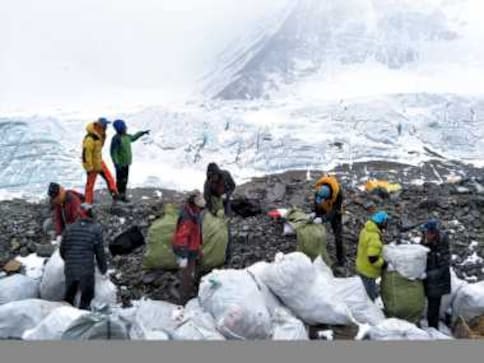 China to admit fewer than 300 Everest climbers annually ahead of major cleanup drive, says State media China to admit fewer than 300 Everest climbers annually ahead of major cleanup drive, says State media
