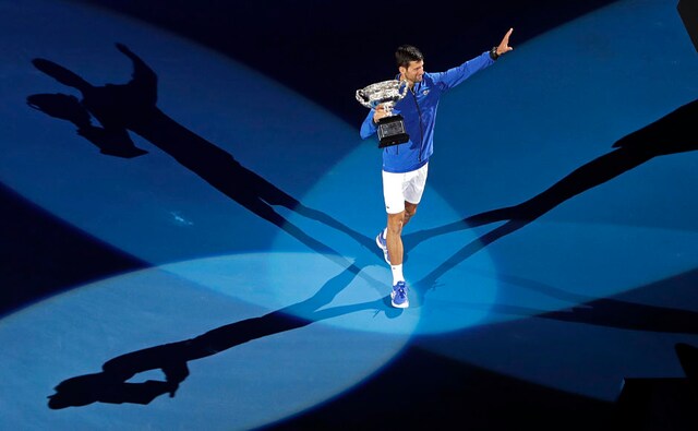 Victory took Novak Djokovic out on his own ahead of Roger Federer and Roy Emerson, who both won six Australian Open men's singles titles. Djokovic has now completed a hat-trick of Slams following his wins at Wimbledon and the US Open. AP Photo Victory took Novak Djokovic out on his own ahead of Roger Federer and Roy Emerson, who both won six Australian Open men's singles titles. Djokovic has now completed a hat-trick of Slams following his wins at Wimbledon and the US Open. AP Photo