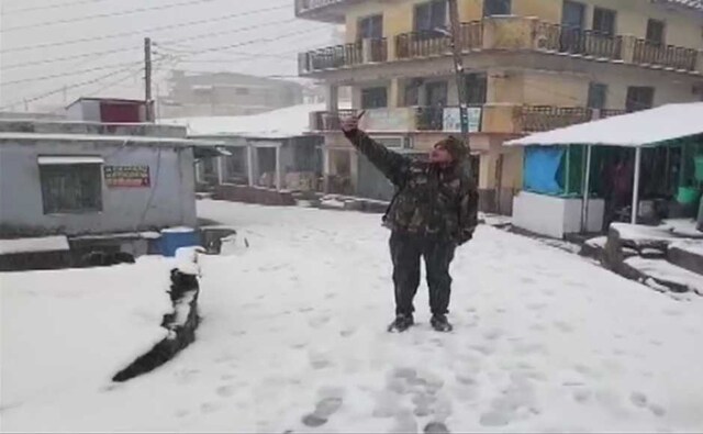 At Ranikhet in Uttarakhand, a fresh layer of snow gave an Armyman an opportunity to click a photograph. ANI At Ranikhet in Uttarakhand, a fresh layer of snow gave an Armyman an opportunity to click a photograph. ANI