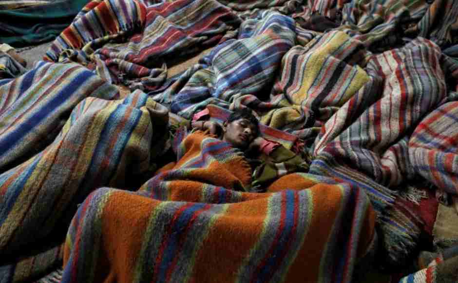 Homeless men sleep inside a government-run night shelter on a cold winter night in the old quarters of Delhi. Reuters/ Anushree Fadnavis Homeless men sleep inside a government-run night shelter on a cold winter night in the old quarters of Delhi. Reuters/ Anushree Fadnavis