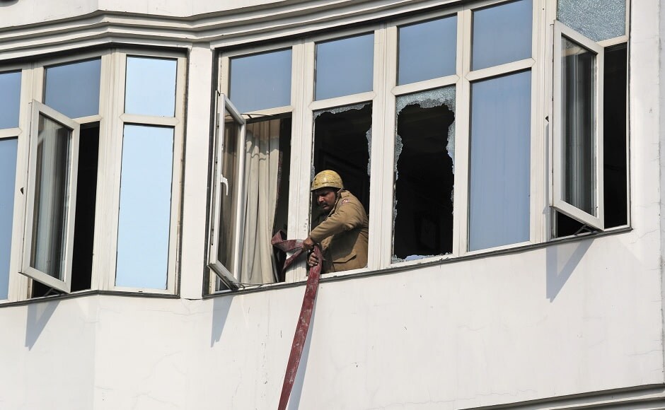 The blaze reportedly began from the second floor of the Arpit Palace Hotel. According to PTI, two were seen jumping off the building to escape the fire. Most deaths resulted from suffocation. The firefighting operation lasted several hours and involved the use of around 25 fire engines. AP The blaze reportedly began from the second floor of the Arpit Palace Hotel. According to PTI, two were seen jumping off the building to escape the fire. Most deaths resulted from suffocation. The firefighting operation lasted several hours and involved the use of around 25 fire engines. AP