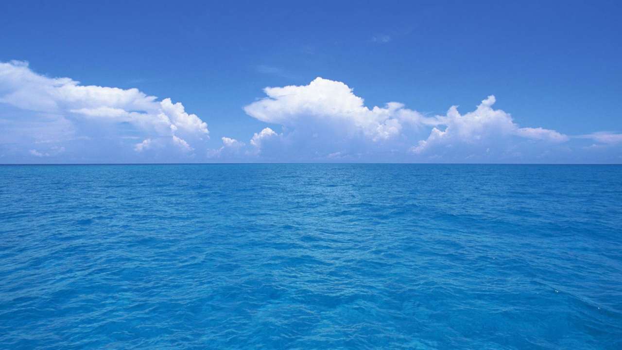 Blue seas and blue skies.
