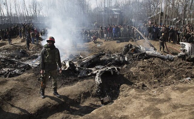 The helicopter crashed in an open field in Budgam’s Garend Kalaan village. Officials had earlier said that the helicopter had caught fire after breaking into two parts. Firstpost/Sameer Mushtaq The helicopter crashed in an open field in Budgam’s Garend Kalaan village. Officials had earlier said that the helicopter had caught fire after breaking into two parts. Firstpost/Sameer Mushtaq
