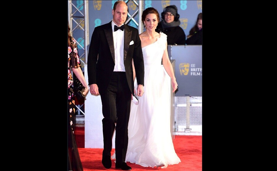 Prince William, who is President of BAFTA, showed up in a black tuxedo accompanied by the Duchess of Cambridge, who wore white Alexander McQueen. Source: Twitter- @AboutWillKate Prince William, who is President of BAFTA, showed up in a black tuxedo accompanied by the Duchess of Cambridge, who wore white Alexander McQueen. Source: Twitter- @AboutWillKate