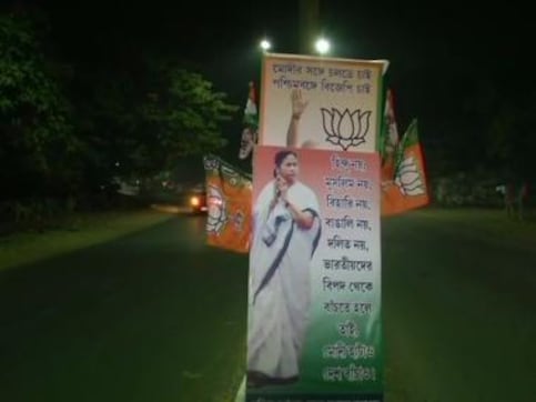 'No democracy in Bengal': BJP cries foul after Mamata Banerjee's posters are placed over Narendra Modi's in Durgapur ahead of PM's visit 'No democracy in Bengal': BJP cries foul after Mamata Banerjee's posters are placed over Narendra Modi's in Durgapur ahead of PM's visit