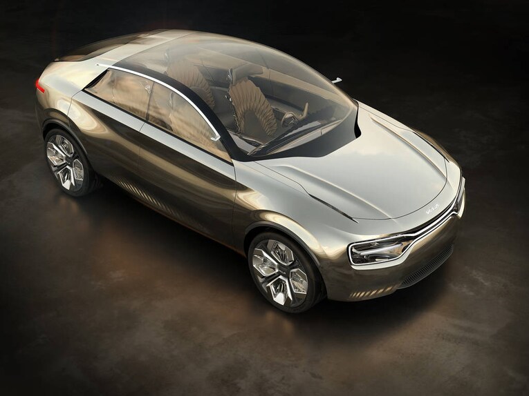 Kia's Imagine EV features a single sheet of glass that flows from the A-pillar up front to the tip of the C-pillar. Kia's Imagine EV features a single sheet of glass that flows from the A-pillar up front to the tip of the C-pillar.