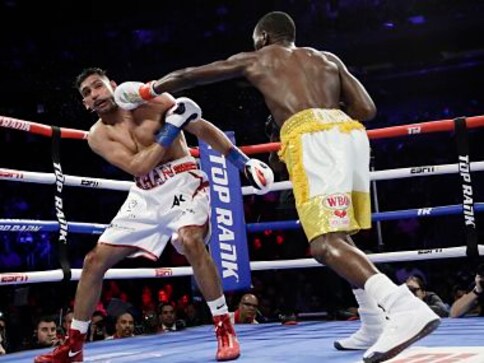 Terence Crawford retains WBO welterweight title after accidental low blow renders Amir Khan unable to continue Terence Crawford retains WBO welterweight title after accidental low blow renders Amir Khan unable to continue