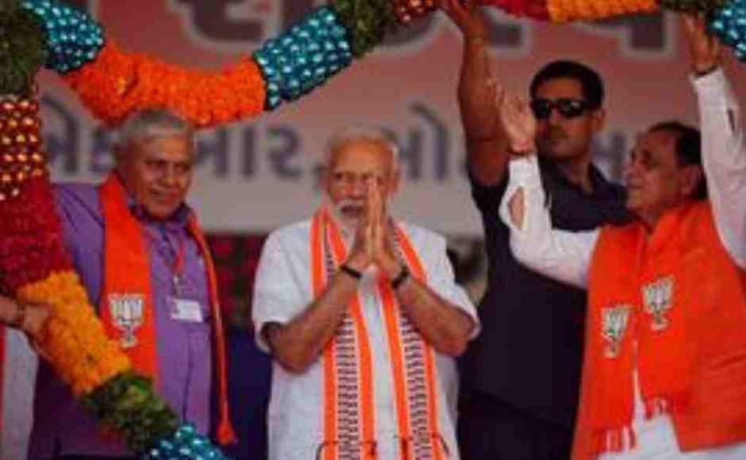 Prime Minister Narendra Modi gestures as he is presented with a garland during an election campaign rally in Junagadh, Gujarat on Wednesday. Reuters Prime Minister Narendra Modi gestures as he is presented with a garland during an election campaign rally in Junagadh, Gujarat on Wednesday. Reuters