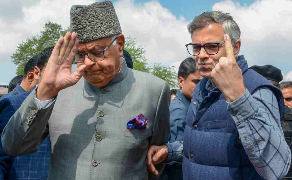 National Conference president and Srinagar parliamentary candidate Farooq Abdullah with his son and former chief minister Omar Abdullah leave after casting vote at a polling station in Srinagar. PTI National Conference president and Srinagar parliamentary candidate Farooq Abdullah with his son and former chief minister Omar Abdullah leave after casting vote at a polling station in Srinagar. PTI