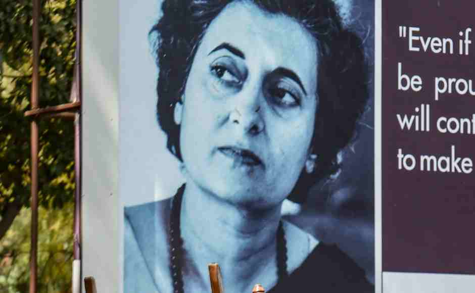 Outside the venue in New Delhi, photographs of Indira Gandhi on display. PTI Outside the venue in New Delhi, photographs of Indira Gandhi on display. PTI