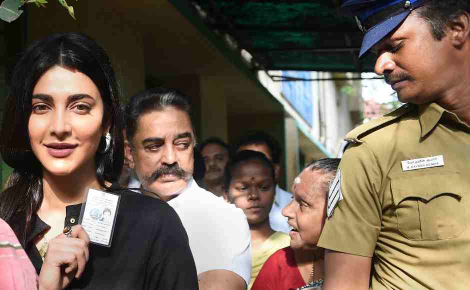 Makkal Needhi Maiam founder-president Kamal Haasan with his daughter and actress Shruti Haasan (front) wait in a queue to cast their vote at a polling station in Chennai. PTI Makkal Needhi Maiam founder-president Kamal Haasan with his daughter and actress Shruti Haasan (front) wait in a queue to cast their vote at a polling station in Chennai. PTI