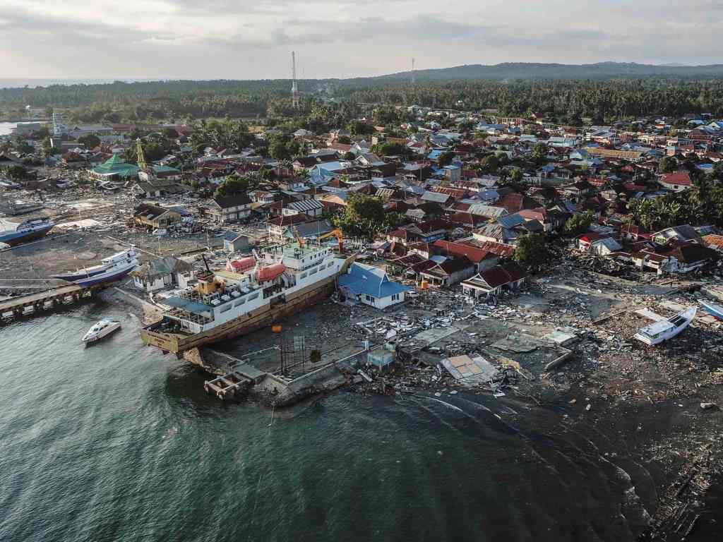 A ship stranded amid destruction after an earthquake and tsunami hit Indonesia, near the mouth of the Sulawesi island. Image: Reuters