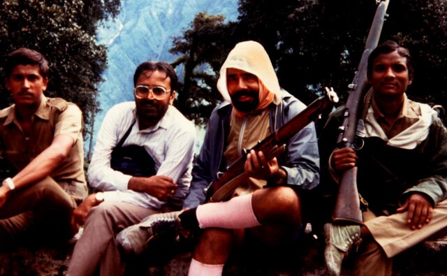 Narendra Modi is seen holding a rifle along with his friends and some police personnel during the Kailash-Mansarovar Yatra of 1988. Image courtesy: Moving Pixels Narendra Modi is seen holding a rifle along with his friends and some police personnel during the Kailash-Mansarovar Yatra of 1988. Image courtesy: Moving Pixels