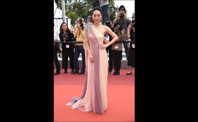 Wu Ke-Xi wore a Gucci multicolor panel tulle gown for the premiere of Nina Wu | Twitter Wu Ke-Xi wore a Gucci multicolor panel tulle gown for the premiere of Nina Wu | Twitter