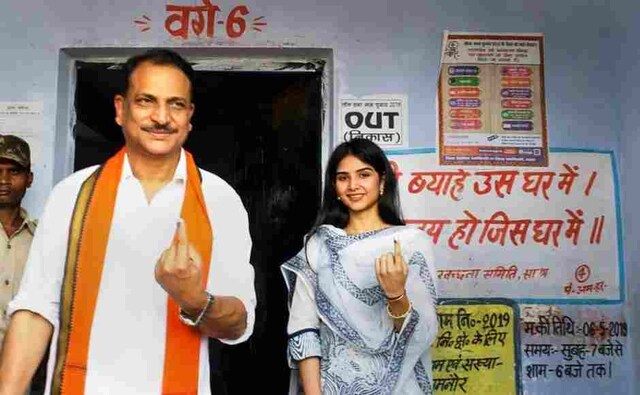 BJP candidate from Saran, Rajiv Pratap Rudy, with his daughter Atisha Pratap showed their inked fingers after casting vote at a polling station in Chhapra. PTI BJP candidate from Saran, Rajiv Pratap Rudy, with his daughter Atisha Pratap showed their inked fingers after casting vote at a polling station in Chhapra. PTI