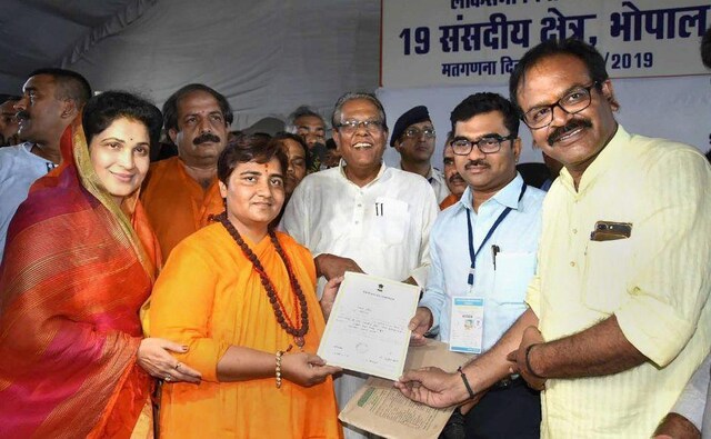 BJP candidate Sadhvi Pragya Singh Thakur collected her victory certificate after declaration of result for Lok Sabha elections at old Central Jail, in Bhopal. Reuters BJP candidate Sadhvi Pragya Singh Thakur collected her victory certificate after declaration of result for Lok Sabha elections at old Central Jail, in Bhopal. Reuters