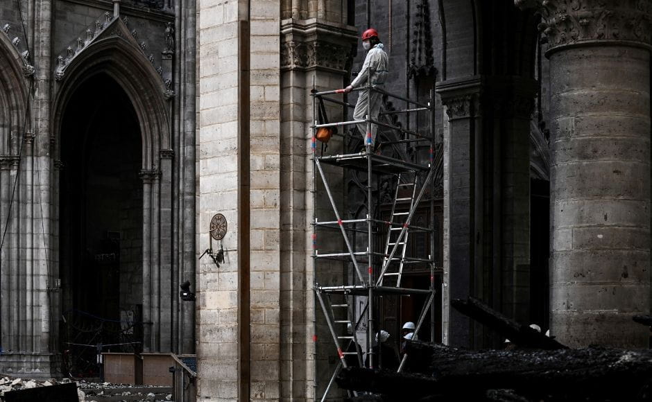 A national and cultural symbol, the 13th-century Gothic cathedral's burning resulted in national mourning. French President Emmanuel Macron called for unity and declared that the cathedral would be restored in five years, which many experts consider an impossible timeline. Reuters via Pool/Philippe Lopez. A national and cultural symbol, the 13th-century Gothic cathedral's burning resulted in national mourning. French President Emmanuel Macron called for unity and declared that the cathedral would be restored in five years, which many experts consider an impossible timeline. Reuters via Pool/Philippe Lopez.