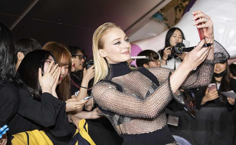 The actress takes a selfie with fans The actress takes a selfie with fans