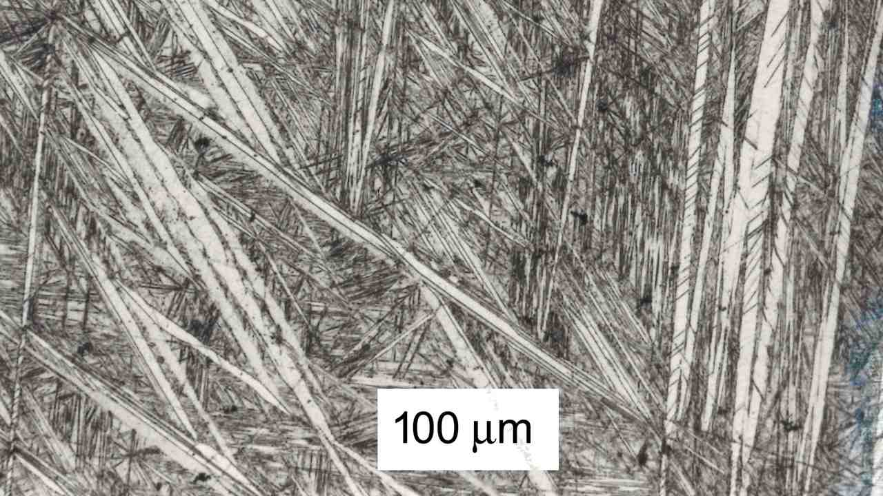 The presence of martensite needles in microsections taken through high-tin bronze artefacts is a sure sign that they have been quenched into water from red heat.. Image credit: Michael Cortie