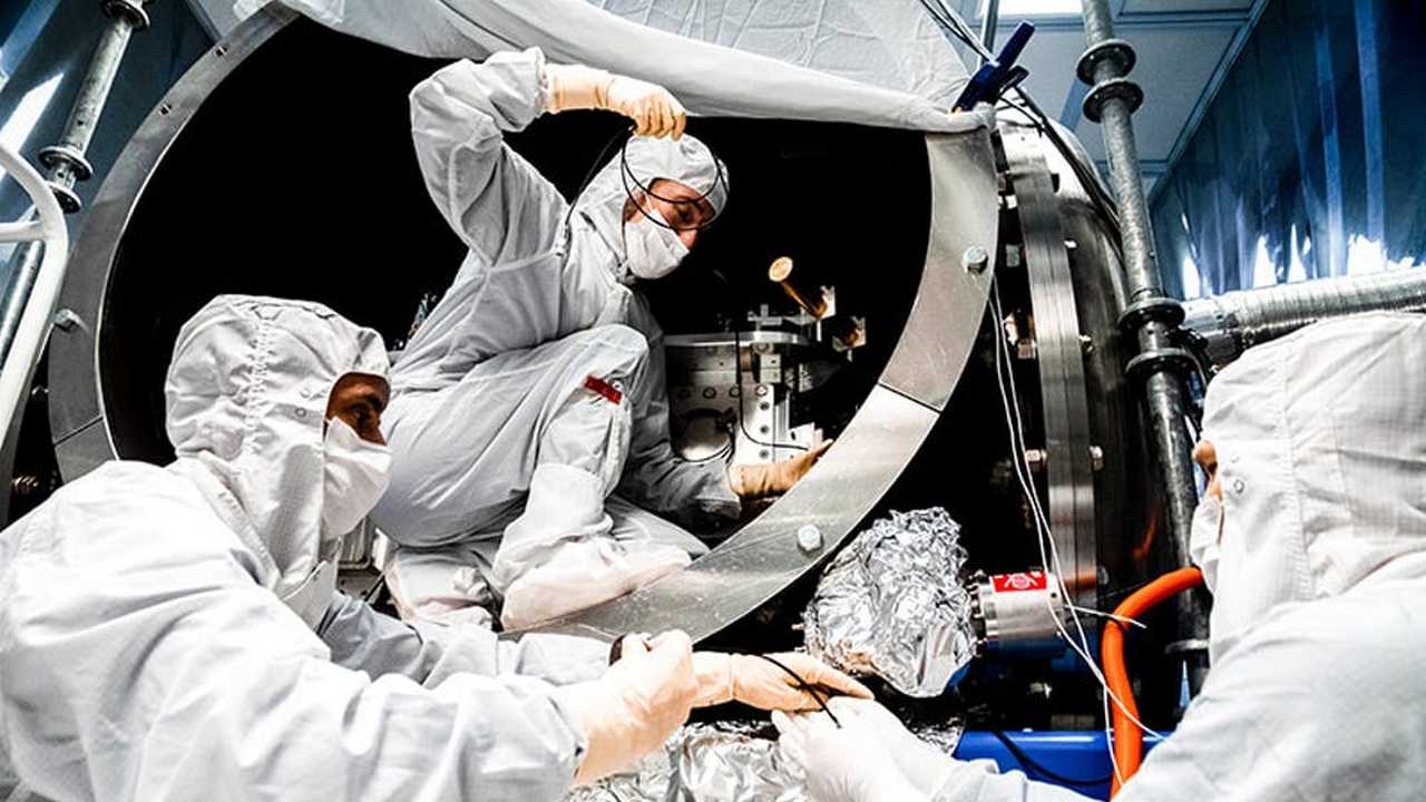 LIGO team members (left-to-right: Fabrice Matichard, Sheila Dwyer, Hugh Radkins) install in-vacuum equipment as part of the squeezed-light upgrade. Image credit; Nutsinee Kijbunchoo/ANU