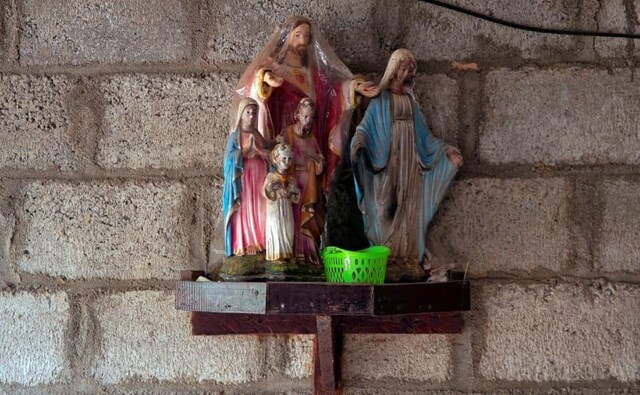 Statues of Mary and Jesus are seen inside the unfinished house of Lahiru Prasanga Fernando and his wife Diliini Sangeewani, who were killed. Reuters/Danish Siddiqui. Statues of Mary and Jesus are seen inside the unfinished house of Lahiru Prasanga Fernando and his wife Diliini Sangeewani, who were killed. Reuters/Danish Siddiqui.