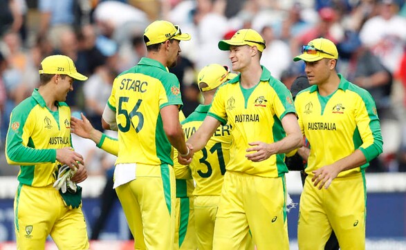 Australia players celebrate their victory over England as the five-time champions advanced to the last-four stage. AP Australia players celebrate their victory over England as the five-time champions advanced to the last-four stage. AP