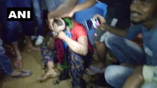 Odisha: Miffed over inter-caste relation, angry mob tonsures couple, parades them; police complaint filed against 21 accused Odisha: Miffed over inter-caste relation, angry mob tonsures couple, parades them; police complaint filed against 21 accused